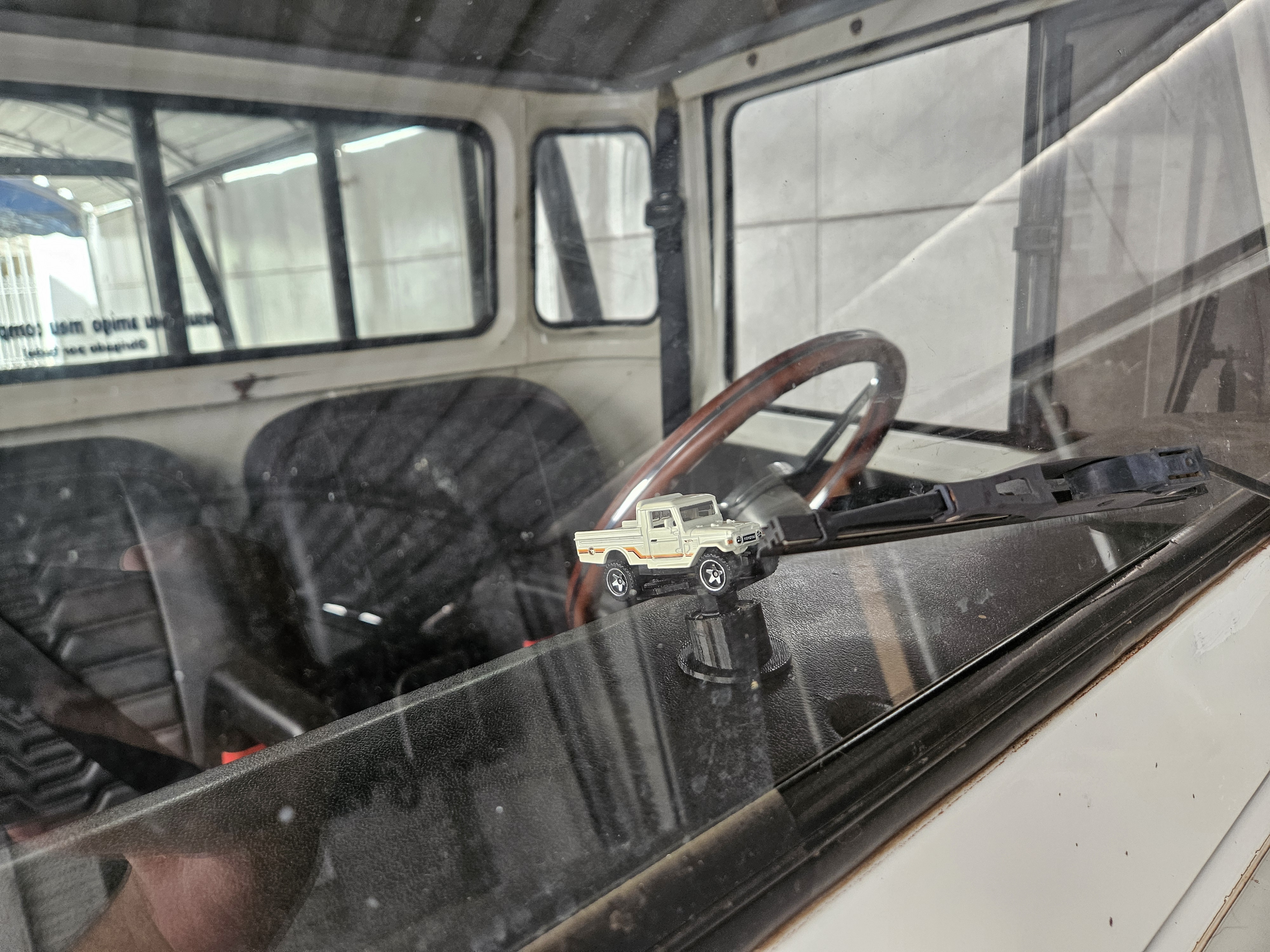 Hot Wheels holder on the dashboard